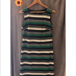 Over the head dress that includes hanger straps.